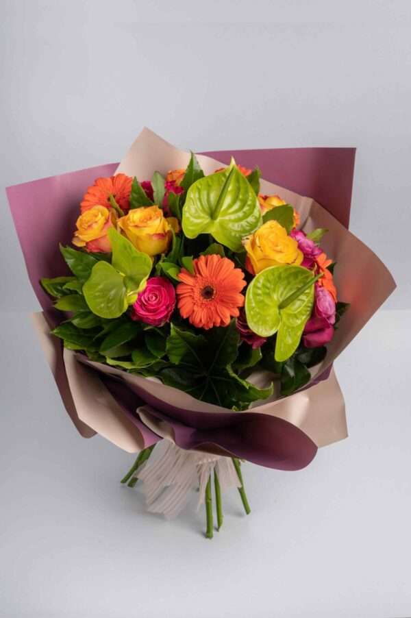 Bouquet of yellow roses and orange gerberas